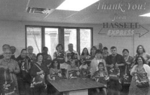 New Hassett Express Employees with Welcome Bags from the Greater Oak Brook Economic Development Partnership